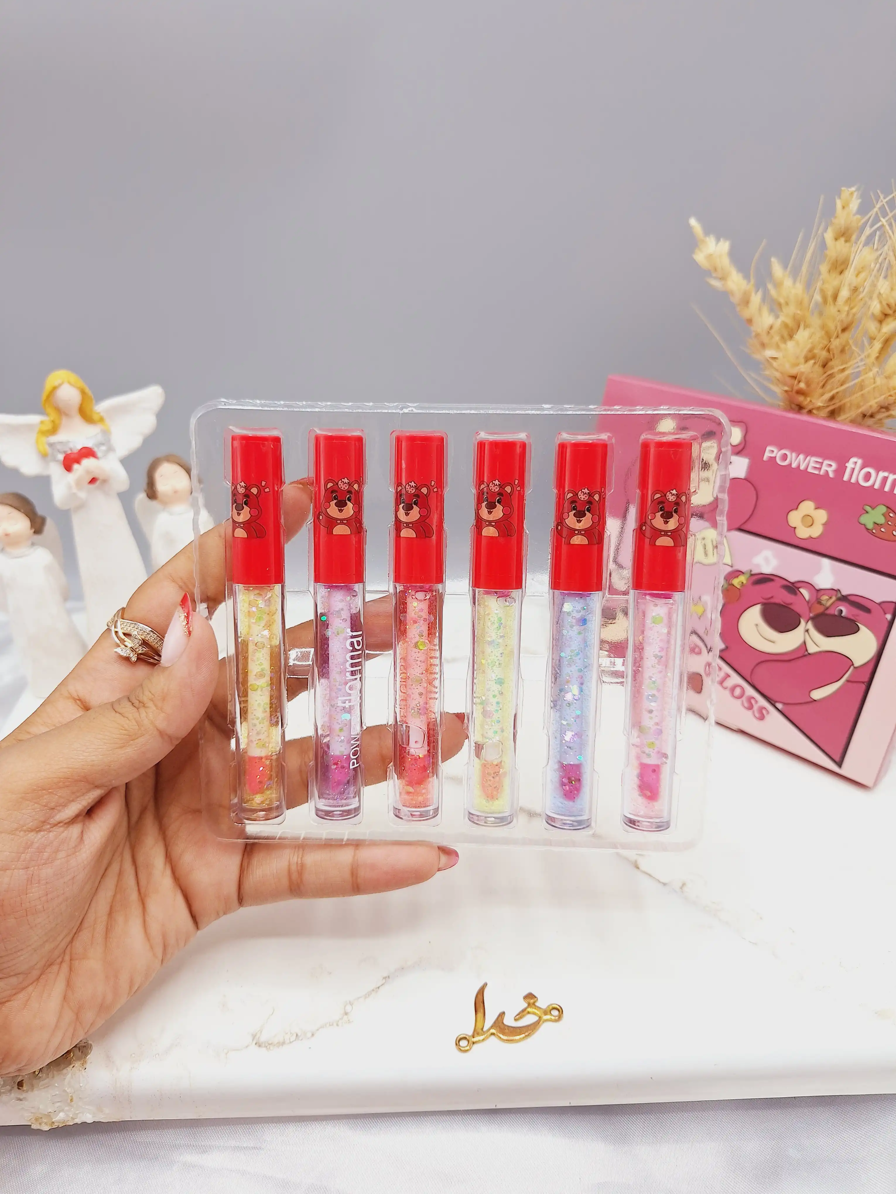 پک 6 تایی لیپ گلاس شاین دار خرس عاشق برند POWER flormar کد 1018